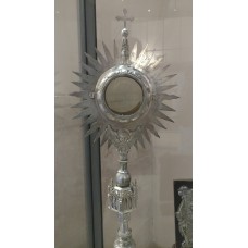 Monstrance, sun symbol with cross on top